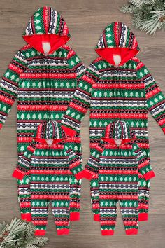 *Adult & child pajamas sold separately* Zip-up onesie style pajamas Red & green holiday Nordic print lends sweet, seasonal charm Soft fabric provides cozy all-night comfort Perfect for family Holiday pictures, or relaxing movie nights in Gift your family's wardrobe a seasonally sweet vibe with these Family Red & Green Winter Onesie Pajamas! It features a festive Nordic print for festive flair this is perfect for the holiday season. The front zipper allows for easy wear, while cuff styling ensure Family Holiday Pictures, Sparkle In Pink, Nordic Print, Christmas Clothes, Onesie Pajamas