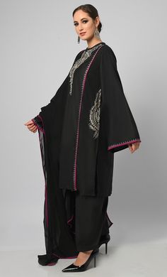 Embroidered black salwar phiran set. It is a detailed and intricate form of contrast piping and zari work embroidered on sleeves, pockets and neck, colorful stitches to create patterns and designs on the fabric of the garment. It is a popular choice for special occasions, such as weddings and festivals. Salwar suits are more modern and casual alternative to the traditional salwar kameez Fabric Details TOP Pure polyster poplin with zari work detailing on neck and sleeves, Full loose sleeves Dupat Kashmiri Suits Salwar Kameez, Black Long Sleeve Kurta For Transitional Season, Traditional Long Sleeve Palazzo Set With Embroidered Border, Designer Black Churidar With Embroidered Border, Black Churidar With Embroidered Border And Straight Kurta, Elegant Unstitched Suit With Embroidered Border And Long Sleeves, Transitional Black Kurta With Embroidered Border, Semi-stitched Black Churidar With Embroidered Border, Semi-stitched Black Embroidered Anarkali Set