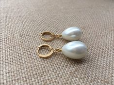 Glass Pearl Pear Shaped Plump Teardrop Earrings on Gold Plated Brass Leverback Hoops by Elegantly Eccentric Designs #pearlearrings #classicpearls #wearmorepearls #handmade #etsy Clip-on Teardrop Pearl Jewelry, Classic Teardrop Clip-on Pearl Earrings, Teardrop Pearl Clip-on Earrings, Teardrop Pearl Clip-on Jewelry, White Teardrop Earrings With Pearl Charm For Formal Occasions, Classic White Teardrop Pendant Earrings, White Pearl Drop Clip-on Earrings For Gift, Classic White Pearl Drop Clip-on Earrings, Anniversary Pearl Drop Teardrop Clip-on Earrings