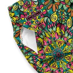 Fantastical Jungle Mandala Swim Trunks: A Vibrant and Symmetrical Pattern Design featuring Whimsical and Colorful Imaginary Plants and Creatures.Transform your wardrobe with this stunning pattern design, perfect for all-over print on Swim Trunks! The "Fantastical Jungle Mandala Swim Trunks" feature an intricate mandala that showcases the radial symmetry of whimsical and colorful imaginary plants and creatures, creating a mesmerizing and eye-catching effect.The mandala at the center of the design