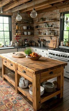 a rustic kitchen with an island in the middle