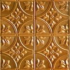 a close up view of a gold tin ceiling tile