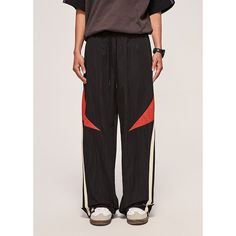 Retro Casual Color-Block Sports Wide-Leg Pants  Material: 55% Polyester+45%Nylon  Size: S, M, L, XL, Color: Black, Brown, Apricot  Season: Spring, Autumn, Winter   Occasion: Leisure, Outdoor, Daily, Vacation Stretch Sports Bottoms With Contrast Color, Stretch Pants With Contrast Color For Streetwear, Black Baggy Parachute Pants For Sports, Sportswear Bottoms With Contrast Color And Stretch, Wide Leg Nylon Parachute Pants For Sports, Nylon Wide Leg Parachute Pants For Sports, Casual Stretch Pants With Contrast Color, Casual Nylon Sweatpants For Training, Casual Training Pants With Pockets