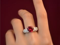 Behold the epitome of love and elegance with our exquisite Heart Cut Ruby Ring, crafted delicately in sterling silver, a symbol of everlasting commitment and passion.  This stunning piece features a vibrant 10*10 MM Ruby gemstone, weighing 4.5 CT, nestled gracefully within a sterling silver setting.  Perfect for any occasion, whether it's a promise of forever, an engagement to cherish, or a celebration of enduring love, this ring transcends time and tradition.  Each ring is meticulously crafted Heart-shaped Ruby Wedding Ring, White Gold Heart-shaped Ruby Wedding Ring, White Gold Crystal Ring For Wedding On Valentine's Day, Heart Shaped Ruby Ring In White Gold For Wedding, White Gold Crystal Wedding Ring For Valentine's Day, White Gold Crystal Ring For Wedding And Valentine's Day, Elegant Diamond Crystal Ring For Valentine's Day, Valentine's Day Ruby Ring With Accent Stones For Anniversary, Valentine's Day Wedding Birthstone Ring With Diamond Accents