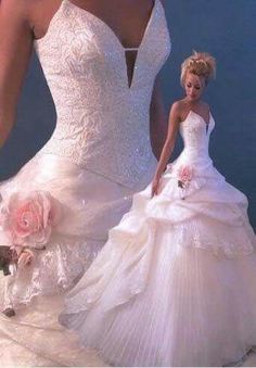 a barbie doll dressed in a white wedding gown and holding a bouquet with roses on it