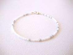 White bracelet, seed bead bracelet, ankle bracelet,plus size bracelet,friendship bracelet,minimalist Dainty White Bracelets With Adjustable Length, White Minimalist Friendship Bracelets For Summer, Minimalist Handmade Anklets With Round Beads, White Minimalist Beaded Bracelets For Summer, Minimalist White Beaded Bracelets For Summer, White Jewelry With Tiny Beads For Summer, White Summer Jewelry With Tiny Beads, Simple White Adjustable Bracelets, Summer Silver Bracelets With Tiny Beads