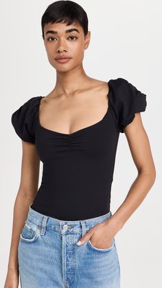 Fast Free Shipping & Free Returns on Free People Bella Thong Bodysuit at Shopbop. Shop new arrivals from Free People at Shopbop.com Spring Stretch Bodysuit With Puff Sleeves, Stretch Short Sleeve Bodysuit For Night Out, Fitted Ruched Puff Sleeve Top, Fitted Short Sleeve Elastane Bodysuit, Trendy Fitted Ruched Puff Sleeve Top, Stretch Bodysuit With Puff Sleeves, Stretch Top With Gathered Short Sleeves, Fitted Puff Sleeve Top With Elastic Shoulders, Stretch Puff Sleeve Top For Night Out