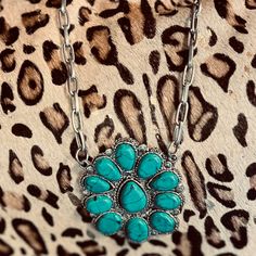 Boast your boho style with The Okley Necklace! Crafted with a turquoise blossom and shimmery chain, this beauty will have 'em doin' a double-take! So go ahead, flaunt it — you're sure to make a statement wherever you go! (And when the compliments come, graciously accept 'em, okley-dokley?) length: 11" extended chain: 3" Double Take, Go Ahead, Boho Style, Boho Fashion, Blossom, Necklaces, Turquoise, Chain, Beauty