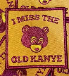 i miss the old kannye patch in purple and yellow with an image of a bear on it