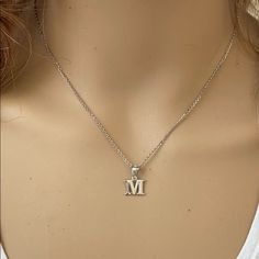 Description: 925 Sterling Silver Mini Small Initial Letter M Pendant Necklace Item No.: H89.Q Metal Type: 925 Sterling Silver (Available In 10k And 14k Gold) Metal Color: Silver Height With Bale: 15 Mm Width: 4.8 Mm Italian Rolo Chain In 16", 18", 20", Available In Another Listings In Any Letter A-Z Classic Sterling Silver Charm Necklaces, Classic Personalized Silver Initial Necklace, Silver Initial Pendant Jewelry For Everyday, Classic Sterling Silver Initial Necklace For Anniversary, Classic Silver Initial Necklace, Silver Initial Necklace In Sterling Silver, Silver Initials Necklace For Everyday, White Gold Sterling Silver Initial Pendant Charm Necklace, Classic Sterling Silver Charm Necklaces With Initials