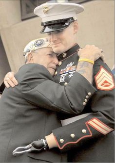 HEROS!  Pearl Harbor Survivor Houston James of Dallas embraces Marine Staff SGT. Mark Graunke Jr. during a Veterans Day commemoration in Dallas. We Are The World, American Patriot, Military Men, Victor Hugo