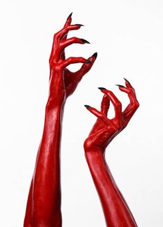 two red hands reaching up towards each other