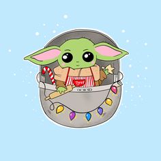 the baby yoda is sitting in a cup with candy and candies on it