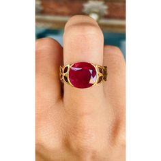 This is part of Chairish’s Fine Jewelry assortment.  Oval Cut Ruby Cocktail ring in 18K Gold which perfectly goes with your personality and also helps you to improve your energy and sensuality. Designed with oval cut ruby in center and metal engraving that makes it a perfect fit to wear it on your wedding or Christmas or any other occasions, you can style it with any of your basic outfit to give it a glam. This is a great bridesmaid, wedding or Christmas gift for anyone on your list.  PRODUCT DE Luxury Oval Ruby Ring With Gemstone, Luxury Oval Ruby Birthstone Ring, Heirloom Oval Ruby Ring Gia Certified, Gia Certified Ruby Ring, Gia Certified Heirloom Oval Ruby Ring, Heirloom Oval Gia Certified Ruby Ring, Heirloom Style Ruby Ring, Luxury Bezel Set Ruby Ring, Gold Gia Certified Ruby Ring