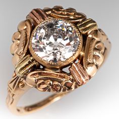 an antique diamond ring with filigree details