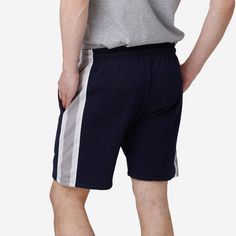 Short and simple, these Dallas Cowboys Side Stripe Fleece Shorts are made to be worn during relaxing gamedays at home to help you add some fleece to your fan fit. Features All-over team-colored design so you can rep the team in style Team logo display on left leg, in case there were any doubts where your allegiances lie Team-colored stripe accents on sides to help you rep your team pride with every stride Adjustable drawstring, because the only thing worse than losing a big game is losing your s Fleece Shorts, Big Game, Side Stripe, Cotton Fleece, Dallas Cowboys, Team Logo, Dallas