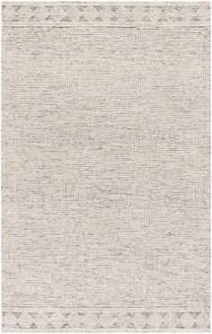 an area rug with white and grey colors