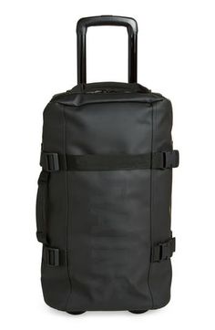 This durable piece of luggage for work or adventures is constructed from Rains’s signature waterproof fabric to keep your travel essentials dry.Closure: Two-way, zip-around closure.Exterior features: A telescopic handle, side-mounted adjustable straps, front zip pocket, top-carry and side-carry handles.Interior features: Two main compartments and compression straps keep your items neatly organized. Waterproof Textile with polyurethane coating Imported Waterproof Luggage For Outdoor Activities, Functional Outdoor Travel Accessories With Zipper, Practical Black Nylon Luggage, Sporty Luggage With Zipper Closure For Trips, Black Functional Luggage With Zipper Closure, Functional Black Luggage With Zipper Closure, Durable Black Luggage For Outdoor Use, Durable Black Luggage For Outdoor, Practical Waterproof Travel Accessories