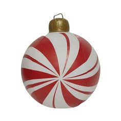 a red and white christmas ornament hanging from a gold - plated ball