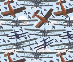 an image of many airplanes flying in the sky with one plane on it's side