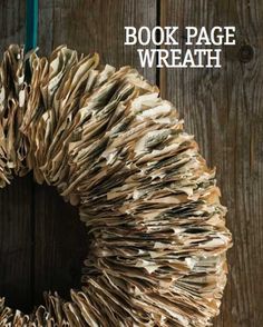 a book page wreath is hanging on a wooden wall with the words, book page wreath