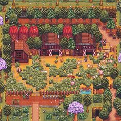 an aerial view of a farm with lots of trees and flowers in the foreground