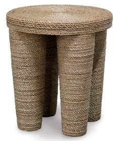 two woven stools sitting next to each other on a white background with the top covered in jute