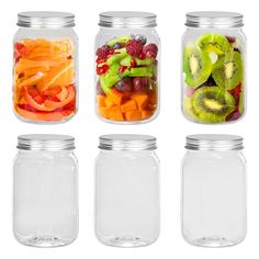 four mason jars filled with different types of fruit in each jar and the lids are clear