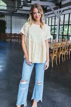 Get ready to rock that babydoll look with our Luciana top! Designed with an oversized fit, this cotton top features short sleeves, a round neck, and a handy chest pocket. Perfect for a playful and effortless style! General Info: 70% Cotton, 30% Linen Hand Wash Cold; Line Dry Babydoll Style Oversized Short Sleeves Round Neck Chest Pocket Back Button Closure Fit Guide: Shape & Fit: Relaxed, Oversized Fabric Elasticity: No Stretch Fabric Texture: Linen Blend Model Info: Height: 5’10” | Bust: 32" | Waist: 24" | Hip: 34” | Size Shown: Small White Jumpsuit Dress, Vintage Flare, Babydoll Style, Top Banana, Plus Size Outerwear, Sporty Girls, Capri Blue, Fabric Texture, Cotton Top