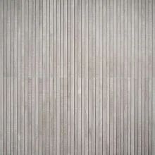 an old wooden wall with vertical lines painted on the wood paneling in grey tones