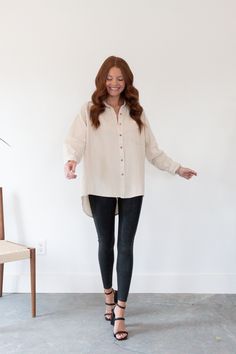 Whether your headed to the office or to dinner, our Wesley Button Up Top is your go-to! This lightweight top can be worn alone or use it as a layering piece under a statement jacket. Button up Collar Long sleeve Longe hemline Non see through Lightweight Textured material Slight stretch True to size Machine wash cold Model wearing size S 100% Polyester Model measurements:- Height: 5'5- Bust: 34"- Waist: 25"- Hip: 36" Statement Jacket, Button Up Top, Lightweight Tops, Layering Pieces, Model Measurements, The Office, Layering, Button Up, Texture