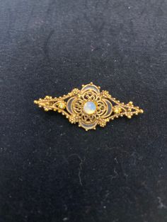 "Vintage Gold Tone Florenz Stamped Brooch. Beautiful.  1 1/2\" L x 1/2\" W" Pin Pendant, Gold Brooches, Vintage Mickey, Blue Rhinestones, Vintage Rhinestone, Vintage Brooches, Vintage Ceramic, Vintage Necklace, Vintage Gold