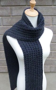 This beautiful hand knitted scarf is made with chunky weight Wool Blend Yarn (80% Acrylic, 20% Wool). Classic ribbed pattern. The scarf can be worn in multiple ways. Very beautiful color. The color may appear slightly different on different monitors. Measures: 67" (170 cm) long x 6" (15 cm) wide. From a smoke-free home. Care instructions: Hand wash in cool water and dry flat. Hand Knitted Scarf, Navy Scarf, Chunky Knit Scarf, Scarf Chunky, Chunky Knit Scarves, Hand Knit Scarf, Blue Scarf, Wool Scarf, Knit Scarf