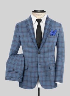 Add a hint of style to your look with our Reda Dusk Blue Checks Wool Suit. Crafted from pure wool, this suit boasts a sleek and effortlessly sophisticated design. The windowpane checkered pattern, created with brown threads on a dusk blue cloth, is perfect for amping up your fashion game to the next level. Wear this suit for any celebration or major event to showcase your refined and stylish appeal.  Look Includes    Reda     Dusk     Blue     Checks     Wool  Fabric  Two Button Jacket Style  No