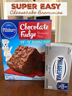 a box of brownie next to a package of chocolate fudge cake mix on a table