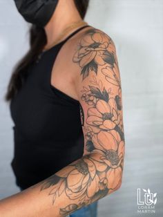 Shows an arm with healed black linework tattoo of flowers. With black line details and shading. Blackwork Floral Tattoo, Half Sleeve Tattoo Upper Arm, Blackwork Floral, Cowgirl Tattoos, Full Tattoo, Beautiful Flower Tattoos, Shoulder Arm Tattoos