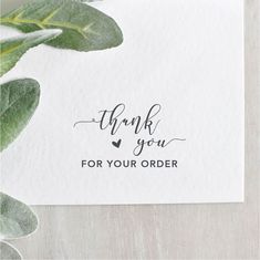 a thank card with the words thank you for your order written in cursive ink