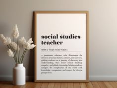 a white vase with flowers in it next to a poster that says social studies teacher