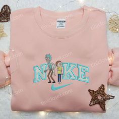 Introducing the Nike x Rick and Morty Embroidered Shirt, a perfect fusion of iconic streetwear and pop culture! This limited Rick And Morty Cartoon, Nike Inspired, Christmas Lamp, Limited Edition Shirt, Custom Nikes, Family Christmas Gifts, Intricate Embroidery, Adulting Shirts, Classic Cartoons