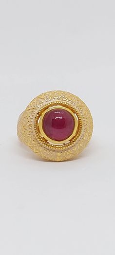 RUBY 24k Gold Plated over 925 Sterling Silver Ring. Ruby Ring. Gold Plated Sterling Silver Ruby Ring. Genuine gemstone Ring. Size 7. Product Info: -Ruby Measurements: 6x6mm round. -Stone: Ruby. - Stone Color: Red -Finish: 24k Gold Plated Over 925 Sterling Silver. -Metal: Solid Gold Plated/ Sterling Silver. -Ring Size: 7 -Handmade item. -Made in USA. -Nice Gift box included. 22k Gold Ruby Ring, Luxury Ruby Ring With Round Stone Setting, 22k Yellow Gold Ruby Ring, 22k Gold Ruby Ring As A Gift, 22k Gold Hallmarked Ruby Ring For Anniversary, Formal Gold Ruby Ring With Round Stone, Hallmarked 22k Gold Ruby Ring For Anniversary, Gold Ruby Ring With Round Stone, Fine Jewelry, Gold Ruby Signet Ring As Gift