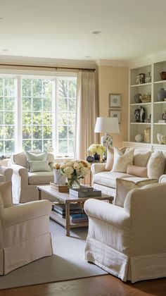 the living room is clean and ready for guests to come home with their family members