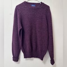 Gorgeous Wool Knit Woolrich Sweater In New Vintage Condition! Never Worn, No Flaws. Tag Is Men’s Medium. Fits Women With An Oversized, Cozy Fit. Shoulder To Hem: 26” Pit To Pit: 20” Sleeve: 26” Indulge In The Understated Charm Of This Woolrich Vintage Knit Sweater. Made From 100% Wool, Its Deep Plum Shade And Drop-Shoulder Silhouette Exude Relaxed Sophistication. Whether You're Going For Casual Chic Or A More Formal Look, This Piece Seamlessly Blends Comfort With Style. The Rich, Deep Purple Hue Vintage Knit Sweater, Vintage Woolrich, Deep Purple Color, Deep Plum, Fits Women, Drop Shoulder Sweaters, Cozy Fits, Wool Knit, Vintage Knitting