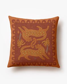 a decorative pillow with an animal design on it