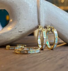 "The perfect hoops for everyone, everyday, all day! These comfortable little beauties will take you from day to night and look great dressed down but fit in to formal events with ease. Super fiery opals are inlaid into these darling little 14k gold plated classic hoops. Hoops measure 20 mm and are 3mm thick. In inches these are about 3/4\" hoops. *Perfect for bridesmaids *These arrive ready for gifting in a cute, boho gift box *Usually ships same day or next *Free shipping on all domestic orders Elegant Stackable Hoop Earrings For Gift, Gift Small Hoop Stackable Earrings, Elegant Stackable Hoop Earrings As Gift, Small Gold Hoop Earrings With Opal, Opal Hoop Earrings, Opal Huggie Hoop Earrings Gift, Elegant Opal Hoop Earrings, Gold Opal Huggie Earrings, Gemstone Hoop Earrings