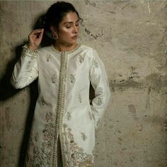 Diwali Palazzo Set With Pearl Embroidery, Bollywood Style Pearl Embroidery Palazzo Set, White Sherwani With Mirror Work For Eid, White Straight Kurta Dress For Reception, Elegant Off White Palazzo Set For Festivals, Elegant Off-white Palazzo Set For Festivals, Elegant Embroidered Off White Palazzo Set, Mirror Work Pant Set With Straight Kurta, Anarkali Front Open Palazzo Set For Wedding