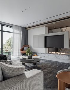 a living room with couches, chairs and a television on the wall in front of a fireplace