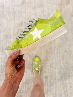 Women's Sequined Star Print Lace Up Tennis Shoes Candace Sneakers, Chartreuse Step into the spotlight with our lace-up Candace sneakers in chartreuse, boasting a glamorous gold sequin heel and enchanting stars motif. These sneakers are the epitome of style and comfort, designed to captivate attention wherever you go. Whether you're stepping out for a casual outing or hitting the town for a night of fun, our Candace sneakers ensure you shine bright with their vibrant color and irresistible sparkl Green Lace-up Platform Sneakers For Spring, Spring Green Lace-up Platform Sneakers, Green Platform Sneakers With Vulcanized Sole For Spring, Trendy Green Platform Sneakers With Laces, Green Spring Sneakers With Perforated Toe Box, Spring Green Sneakers With Perforated Toe Box, Green Sneakers With Perforated Toe Box For Spring, Green Low-top Summer Sneakers, Bright Sneakers