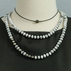 Very modern and elegant piece. This hand knotted white Howlite rondelles necklace is great by itself or as a layering piece. Pave diamond rondelles and faceted silver pyrite beads add a little sparkle and make this necklace more special. Wear this necklace long or double it. Great with : https://www.etsy.com/listing/258023610/beaded-black-spinel-and-silver-pyrite?ref=shop_home_active_23 Necklace is 40 inches long. Check OliverRafCollection for new listings: https://www.etsy.com/your/shops/Oliver Modern White Adjustable Necklace, White Single Strand Necklace For Layering, Modern Adjustable Single Strand Necklace, Silver Hand Knotted Adjustable Necklace, Adjustable Silver Hand Knotted Necklace, White Hand Knotted Jewelry With Round Beads, White Hand Knotted Necklace Gift, Hand Knotted White Round Bead Jewelry, Elegant White Jewelry With Sliding Knot