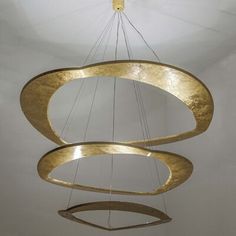 an artistic chandelier hanging from the ceiling