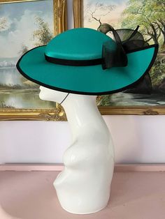 "Classic vintage hat. Perfect for Ascot, weddings, special occasions, very elegant. Comes with elastic to hold hat in place. Condition: vintage perfect Colour: teal Label: Made in England Material: polyester Size: M inner circumference aprox. 21.5-22 inches, circumference 44\"\" *Please note all hats come securely packed in a box *All our vintage items come in clean and best condition possible *Please note all hats come securely packed in a box *All our vintage items are top quality authentic vi Fedora Hats For Kentucky Derby Church Event, Fedora Hats For Church And Kentucky Derby, Cloche Hats For Evening At Royal Ascot, Fedora Hat For Church And Royal Ascot, Evening Cloche Hat For Royal Ascot With Short Brim, Vintage Fedora Wedding Hat, Wide Brim Hat For Church And Royal Ascot, Wide Brim Cloche Hat For Royal Ascot, Elegant Fedora Hat For Church